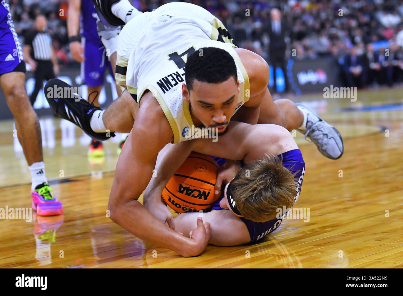 Purdue forward Trey Kaufman-Renn, top, battles High Point forward Simon ...