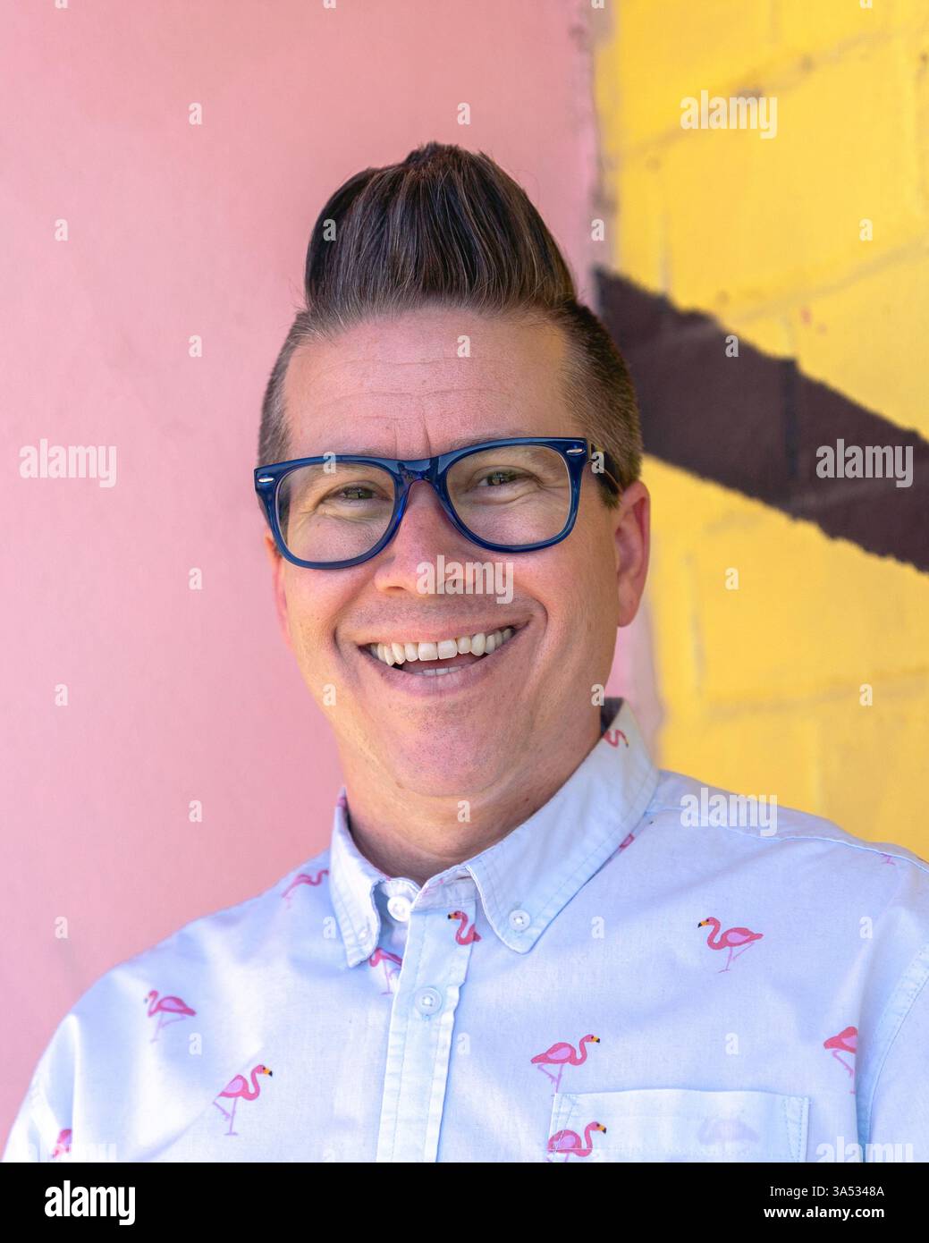 Man in glasses blue shirt hi-res stock photography and images - Alamy