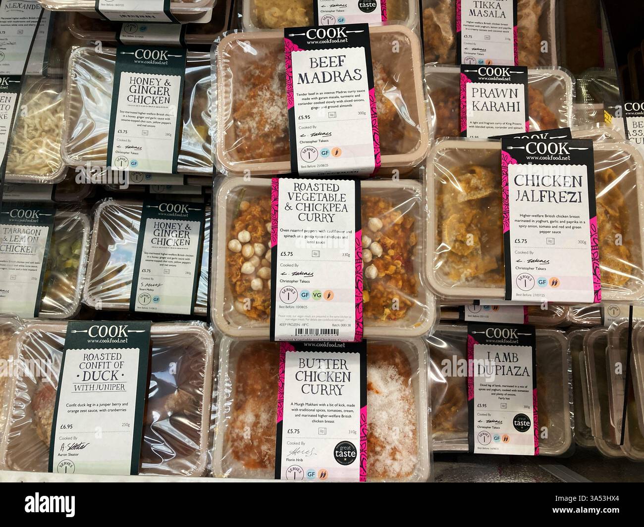 Choice of Individual frozen Ready Meals for sale in a shop freezer cabinet - Smartphone Captured Stock Image