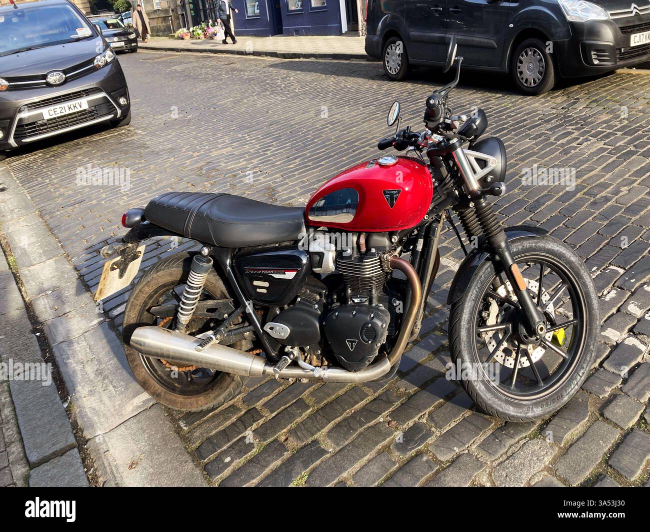 Triumph Speed Twin 900 motorcycle parked up on street - Smartphone Captured Stock Image