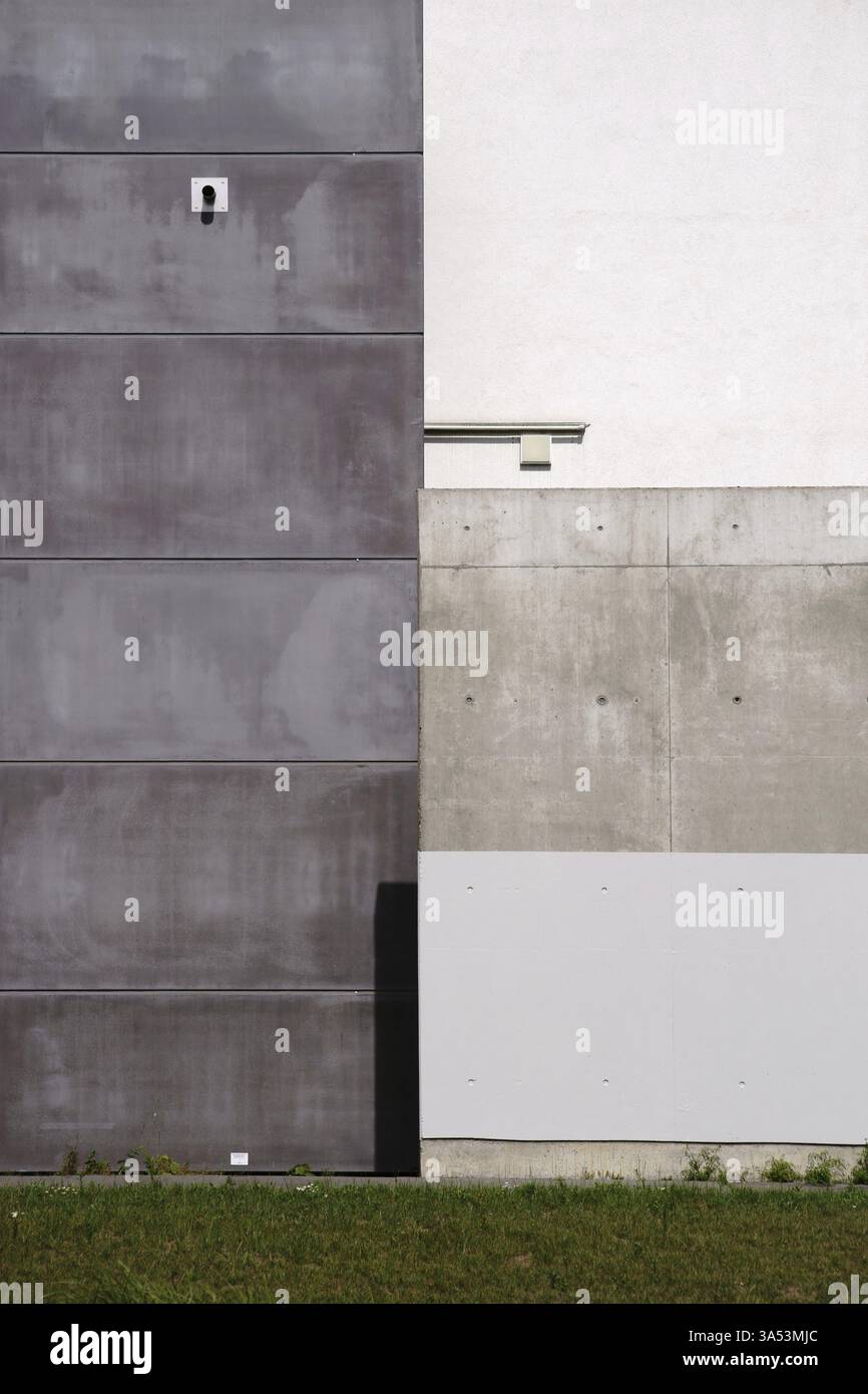Angular interlocking concrete cladding of a facade with different ...
