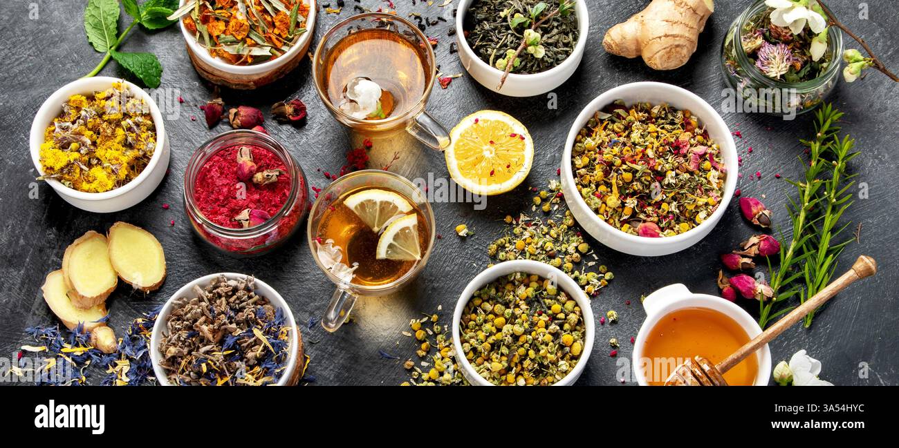 Herbal tea assortment on dark background. Traditional healthcare ...