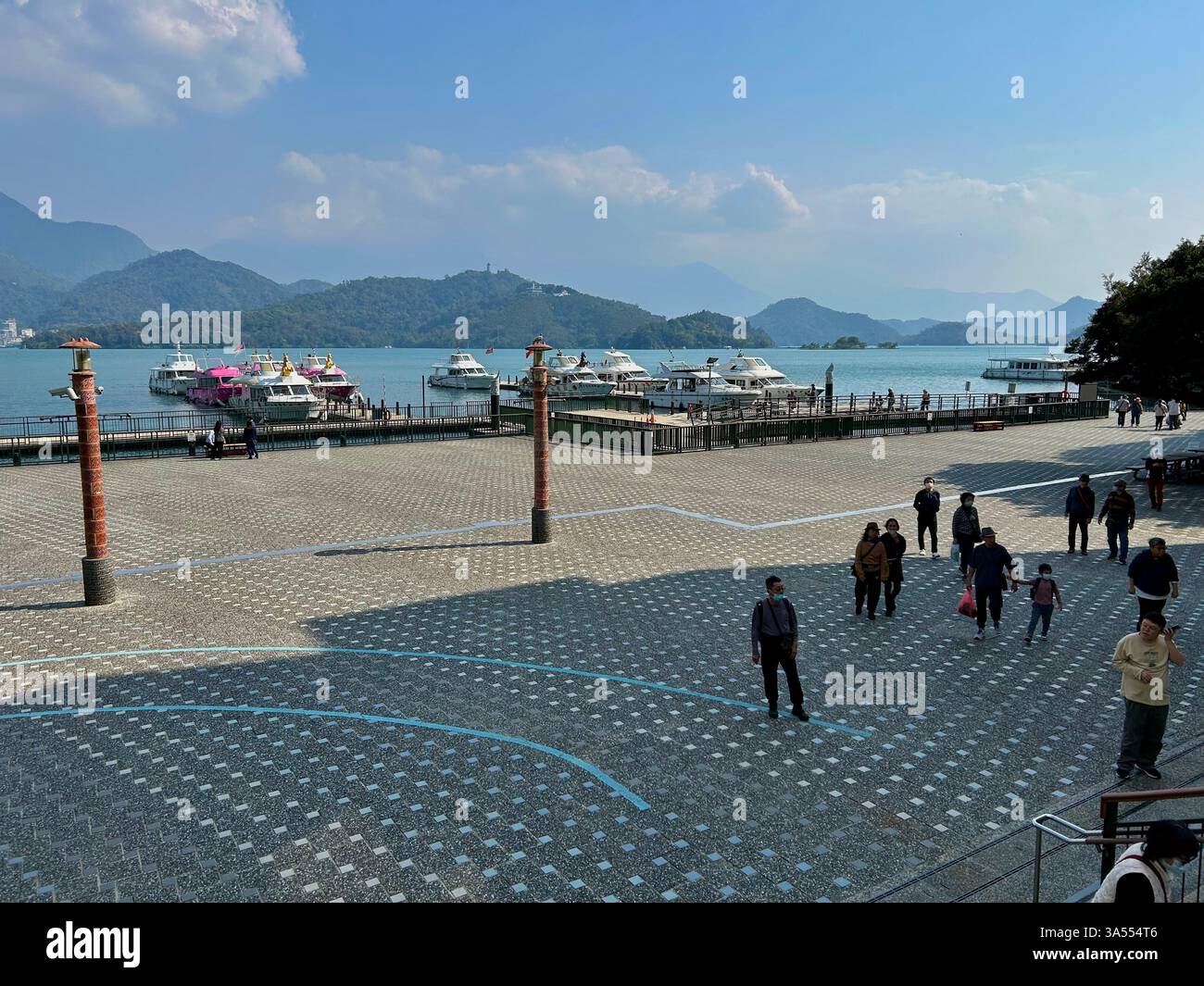 Yuchi, Taiwan, Tourists Visiting Scenic Tourist Area, 'Sun Moon Lake', East Taiwan, - Smartphone Captured Stock Image Yuchi, Taiwan, Tourists Visiting Scenic Tourist Area, 'Sun Moon Lake', East Taiwan, - Smartphone Captured Stock Image