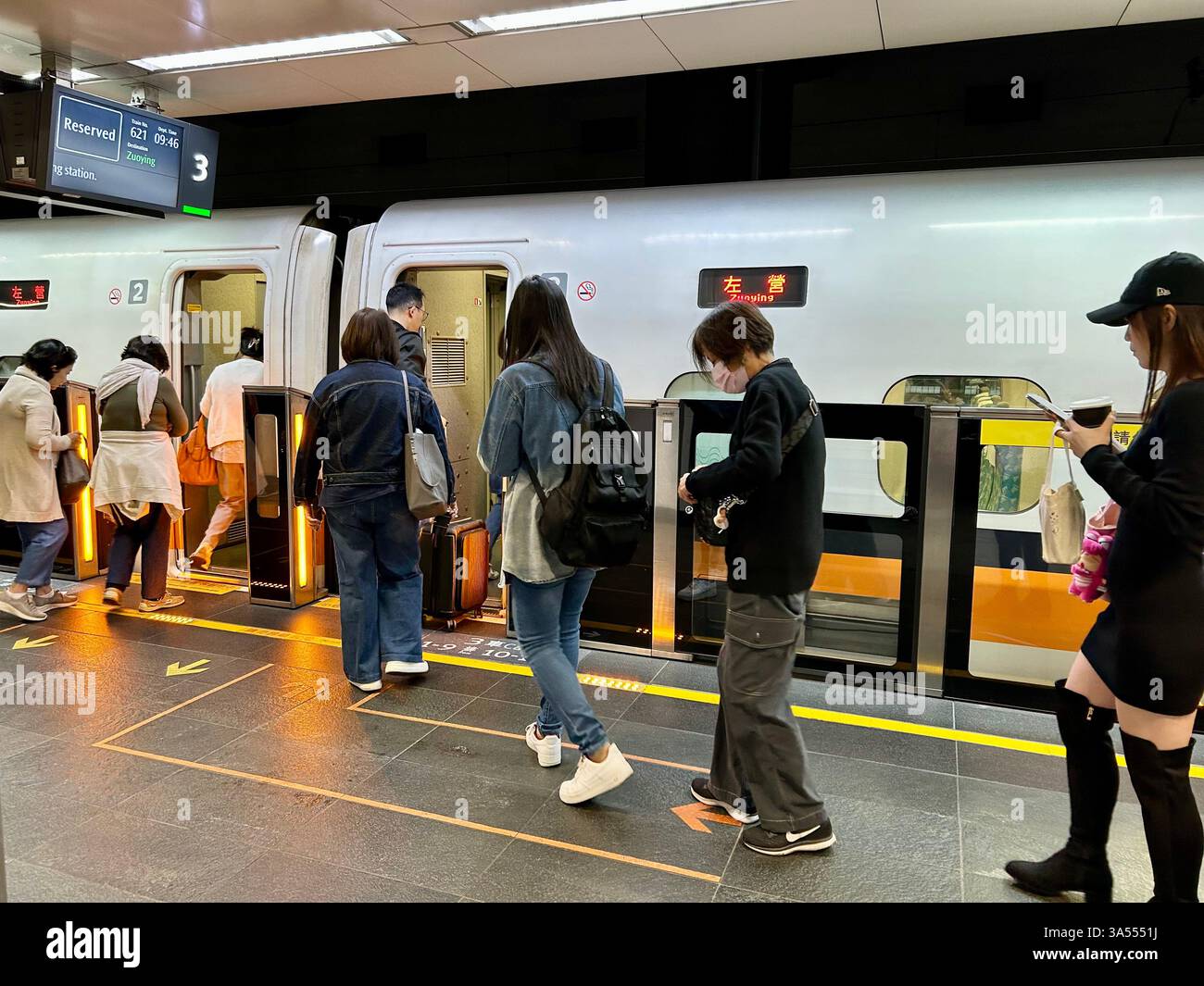 Taipei, Taiwan, Crowd People, Line, Tourists, Traveling, Taipei Main Train Station, Boarding inside, for High Speed Train - Smartphone Captured Stock Image