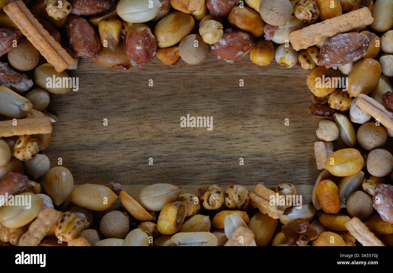 A delightful arrangement of nuts and sweet treats forms a decorative ...