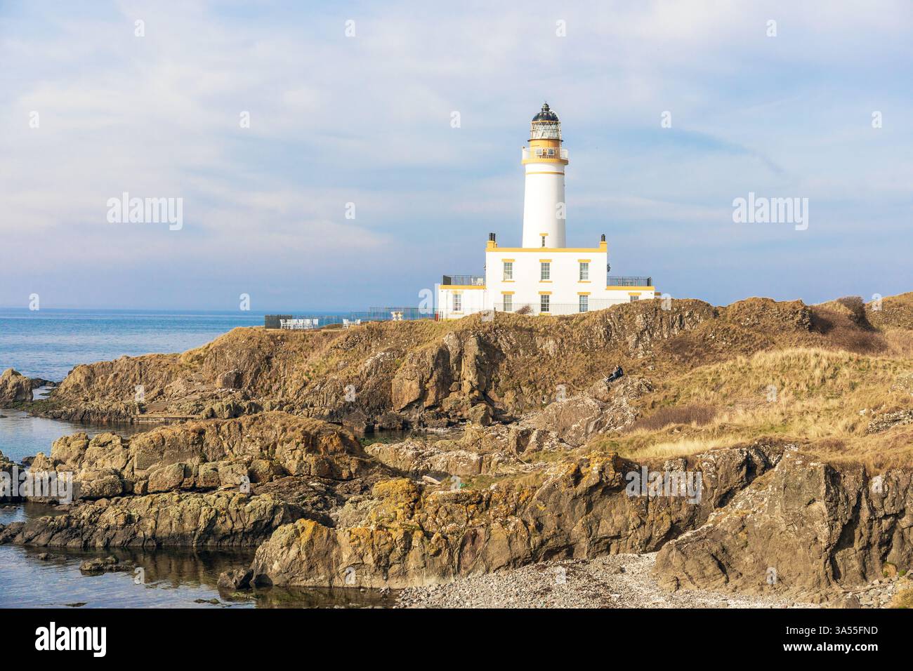 Lighthouse on the coast of the Firth of Clyde, at Ailsa Golf Course, part of the Trump Turnberry hotel complex. Stock Photo