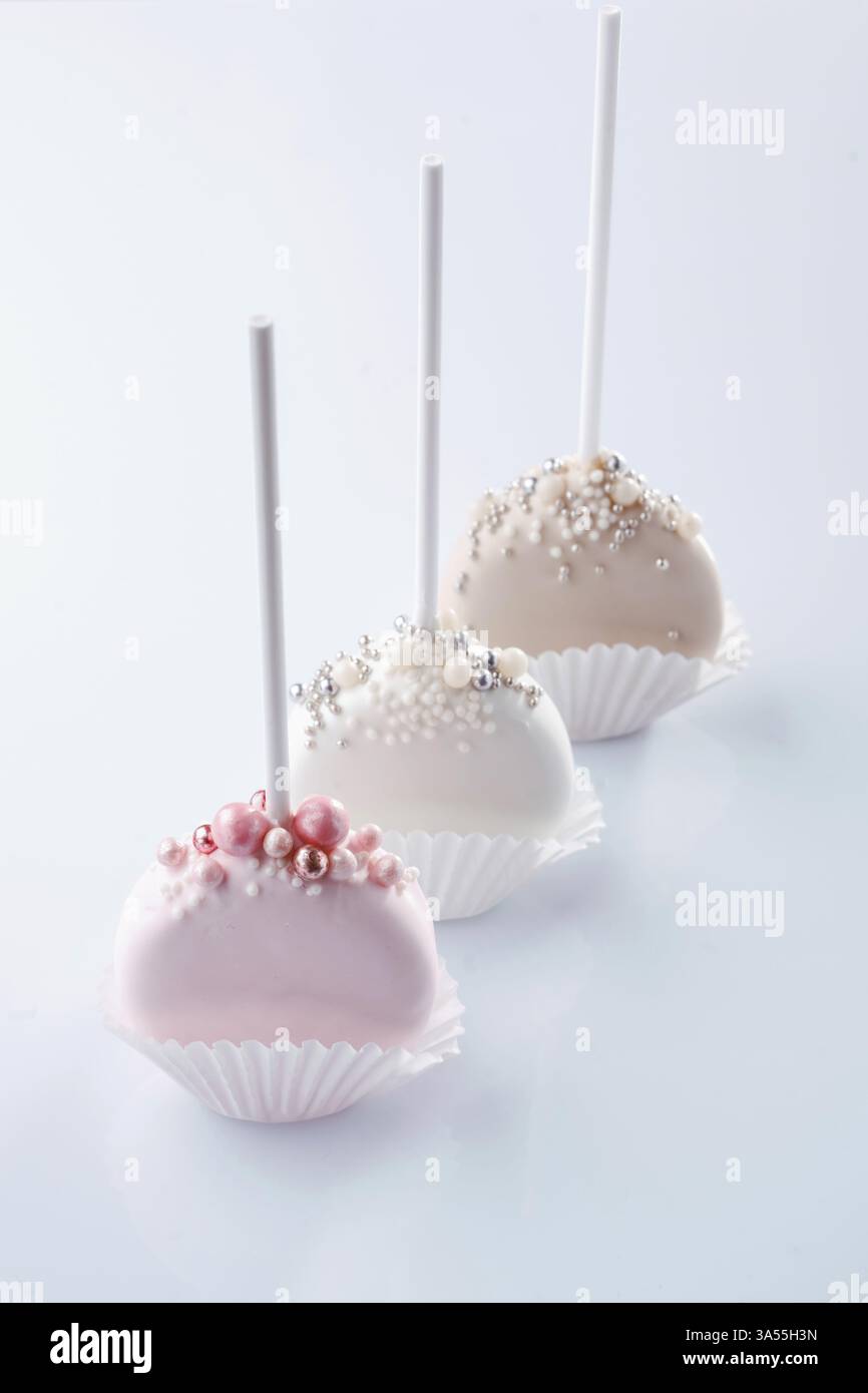 Sweet cakes on the white surface. Stock Photo