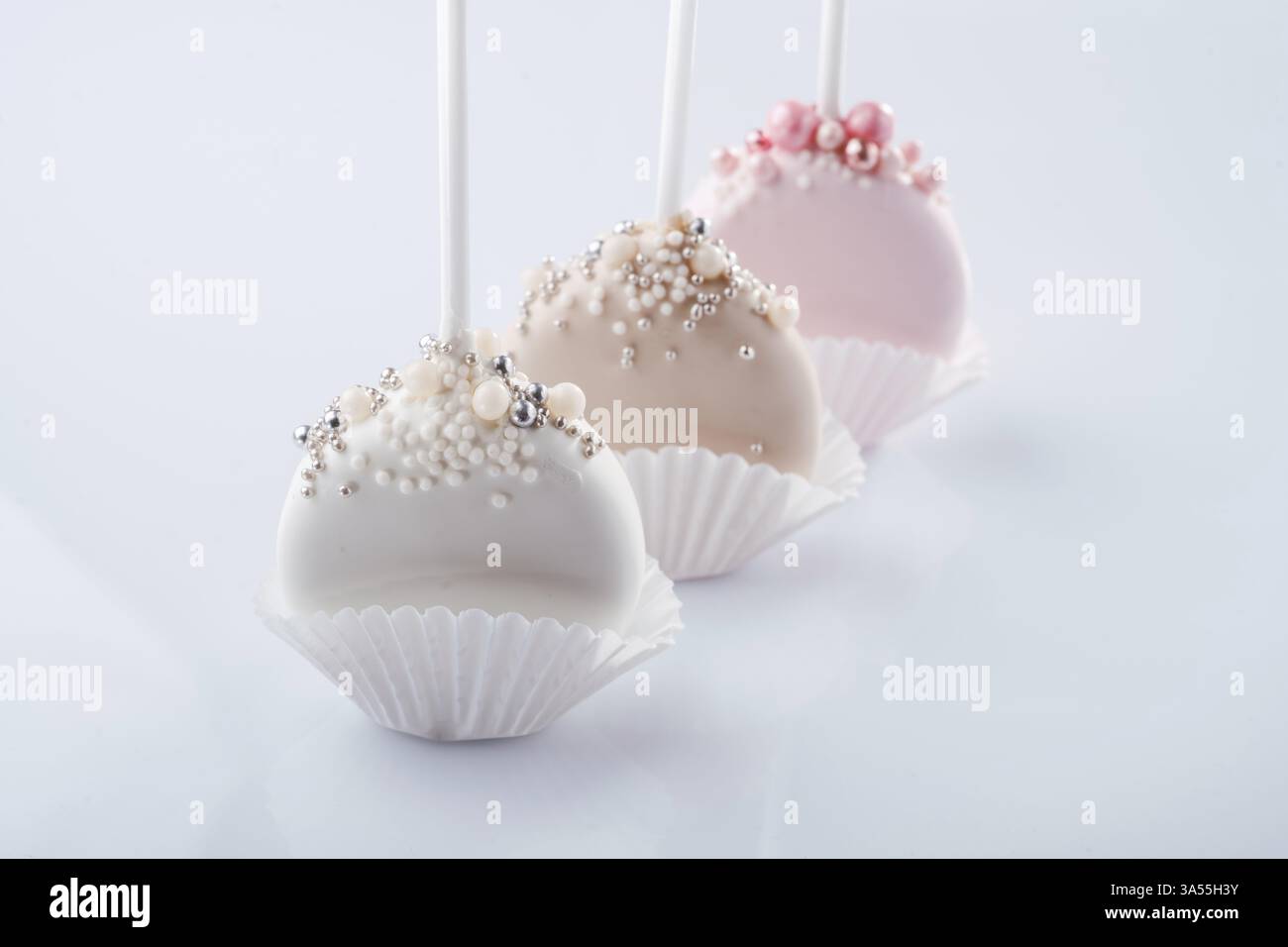 Sweet cakes on the white surface. Stock Photo