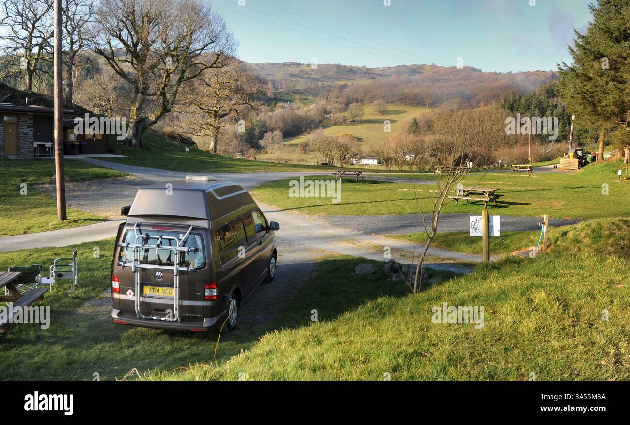 CAMPERVAN IN A QUIET CAMPSITE IN MID WALES RE CAMPING MOTORHOMES VIEWS HOLIDAYS ADVENTURE ETC UK Stock Photo