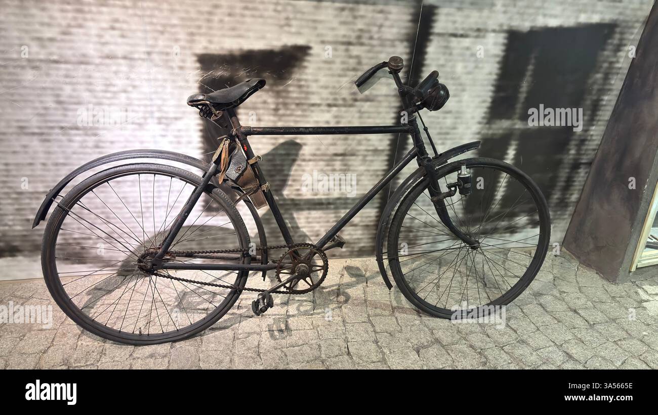 Vintage old bicycle in a museum of Polish Uprising in Łódź, Poland. Old vintage transport - Smartphone Captured Stock Image