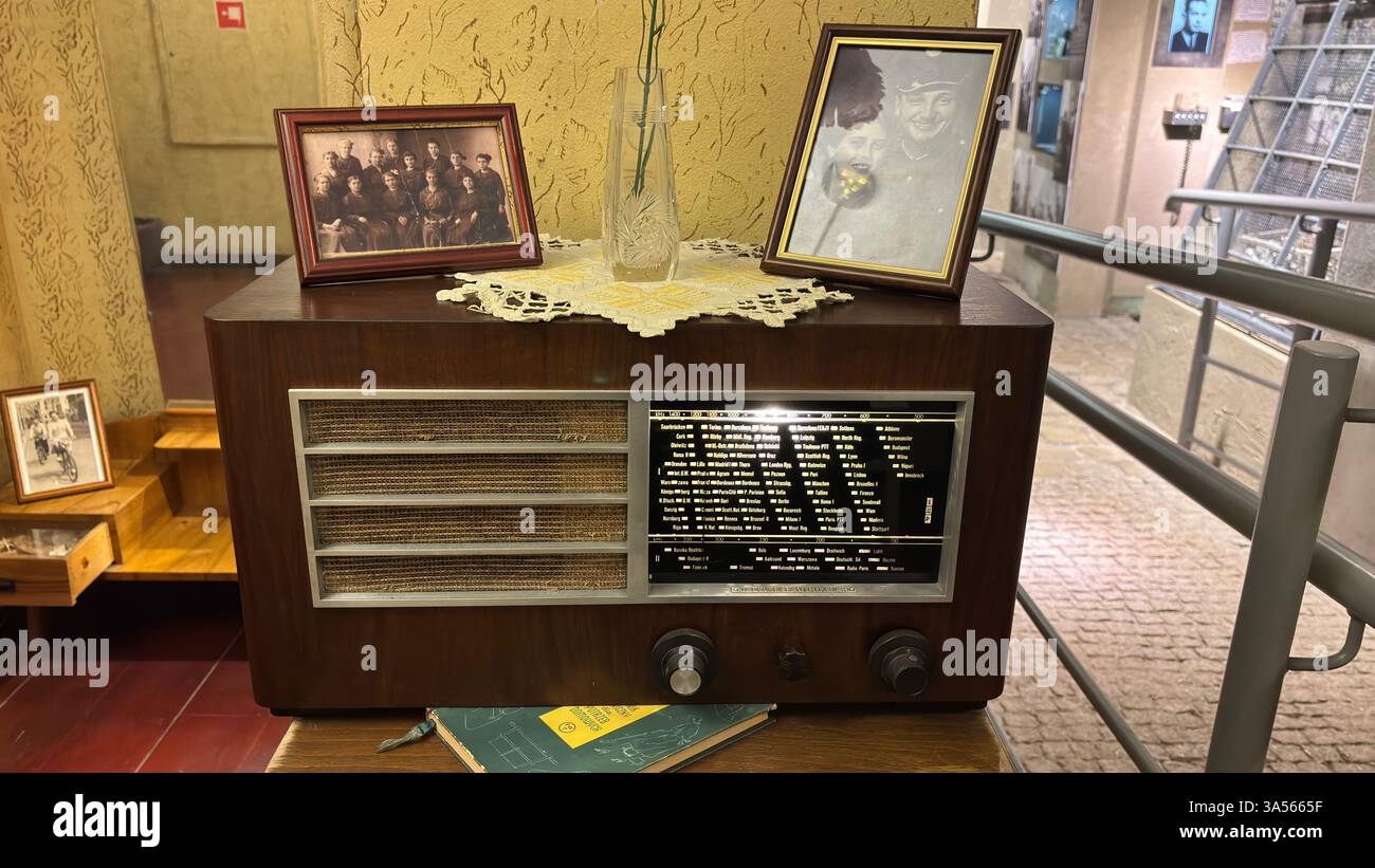 A display of vintage furniture and possessions from old times in a museum in Poznan, Poland - Smartphone Captured Stock Image