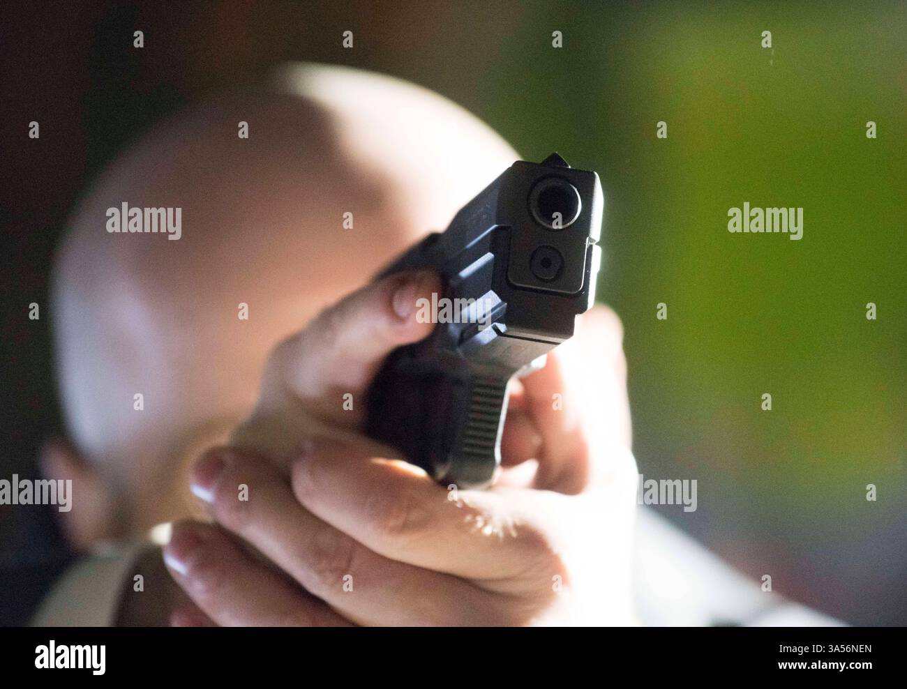 pistol, a handgun for shooting at an attacker or target pistol, a ...