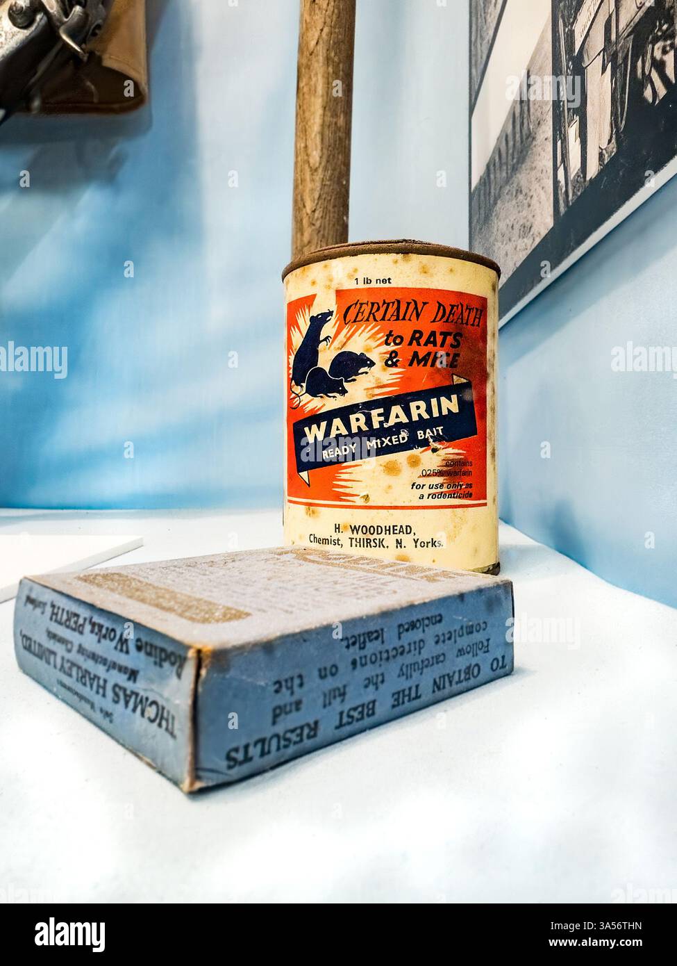 vintage tin of warfarin rat poison exhibit at NELSAM north east land sea & air museum - now used medically as a blood thinner - Smartphone Captured Stock Image
