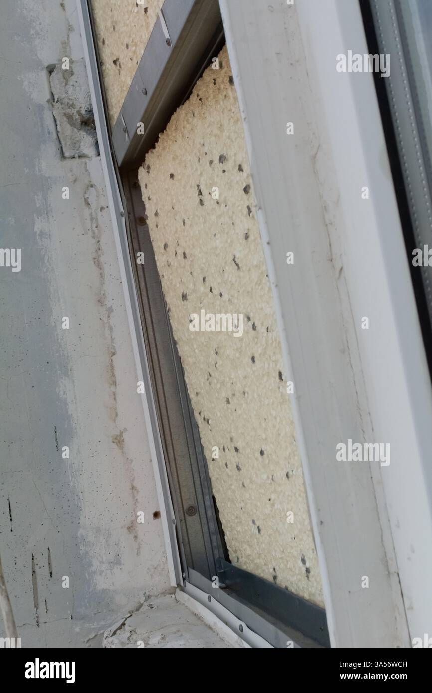 Chipboard in the facade wall. Insulation of the facade of an apartment ...