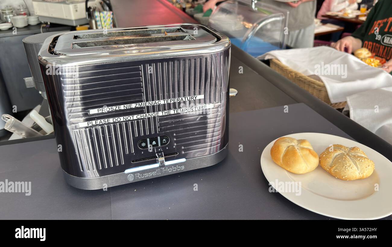 Industrial toaster in a hotel with instructions. Mass catering for buffet breakfast - Smartphone Captured Stock Image