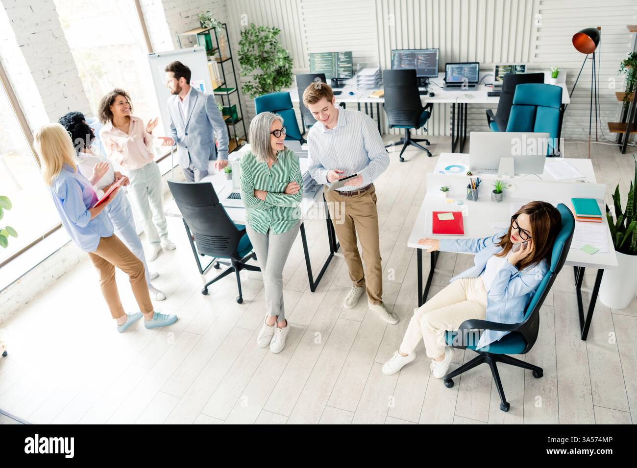 Collaboration Interaction Team collaboration and interaction in a modern office workspace ...