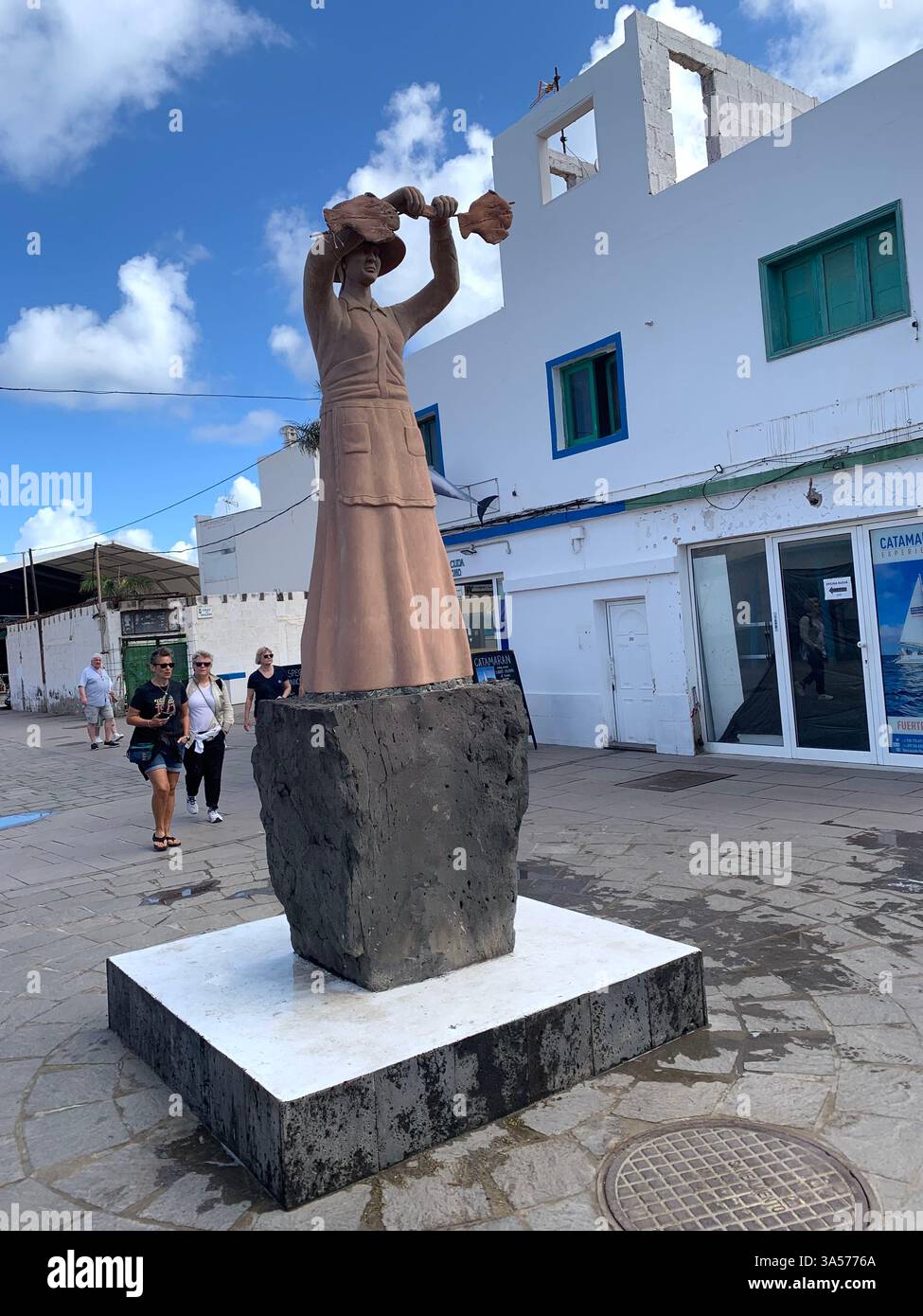Fuerteventura Canary Island Spain Corralejo island village town outside Vulcanic volcano sea shore people life living tourist tourists clouds Sun - Smartphone Captured Stock Image