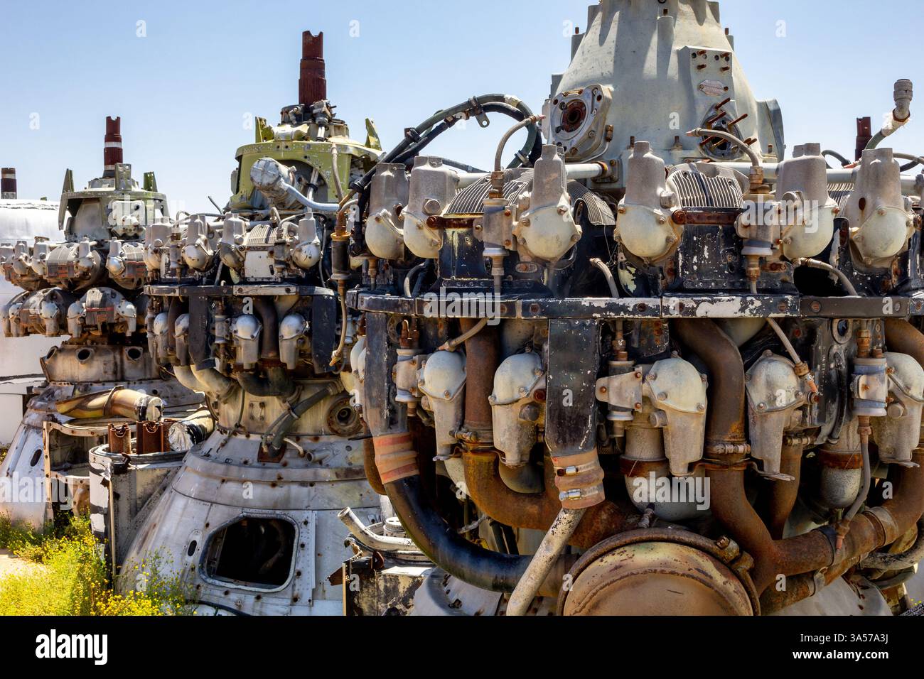 A view of several jet engines and parts at an aircraft graveyard Stock ...