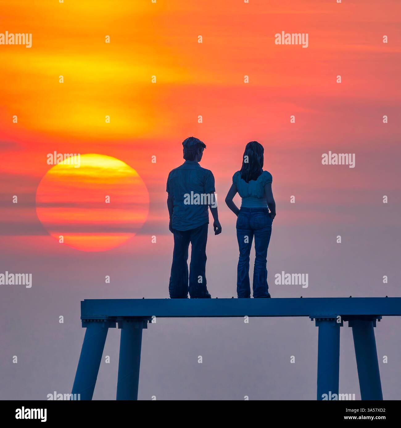 View at dawn of ''Couple'' sculpture by Sean Henry at Newbiggin-by-the ...