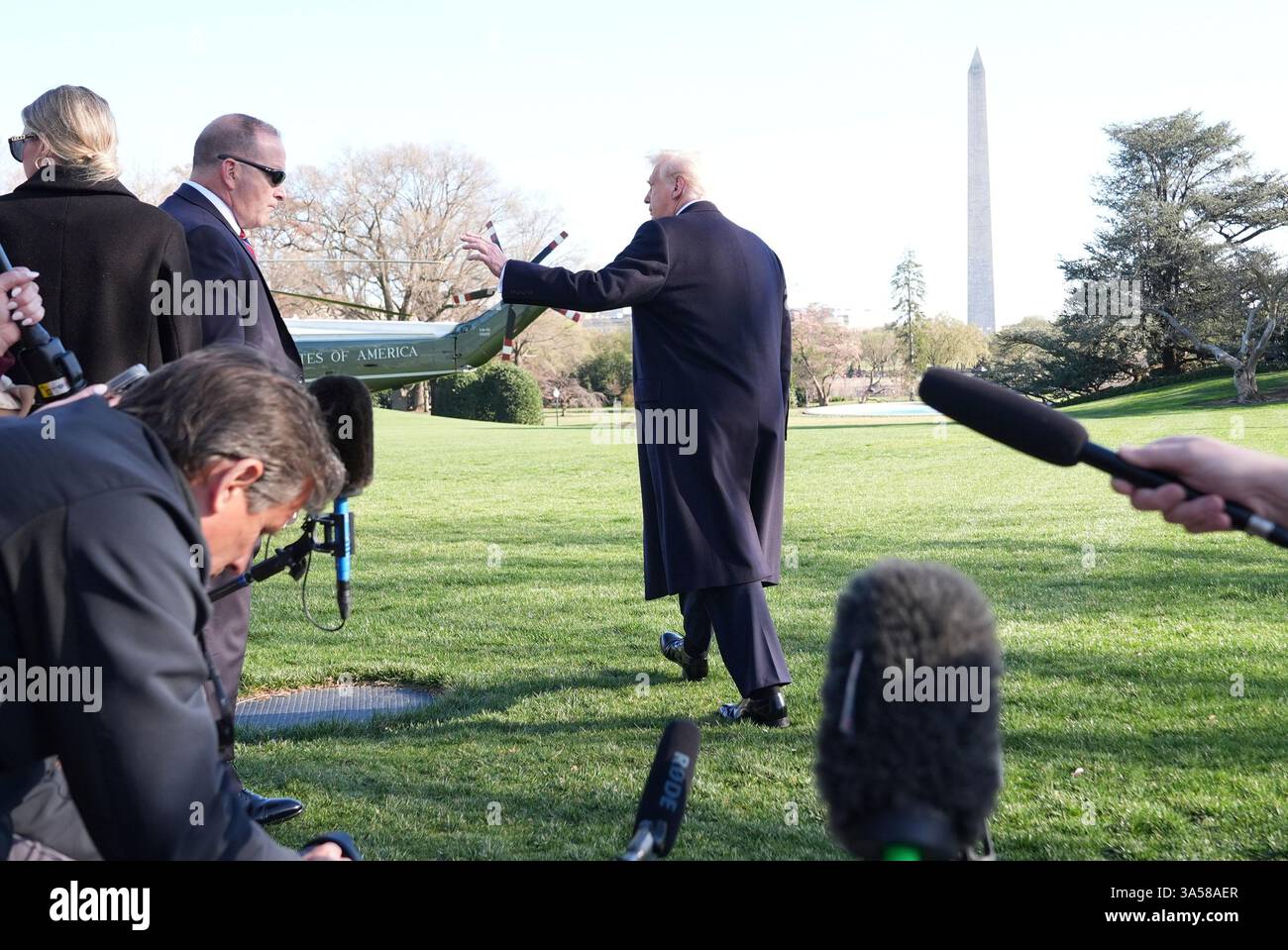 President Donald Trump departs the White House after speaking with ...