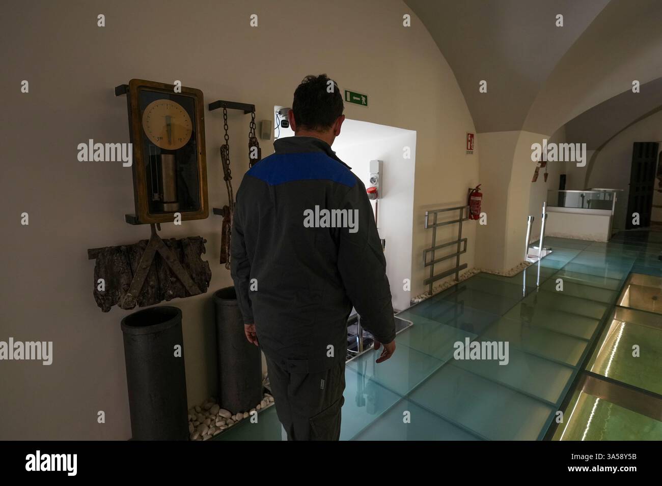 A worker of Rome's main water and energy company, ACEA, walks in Rome's ...