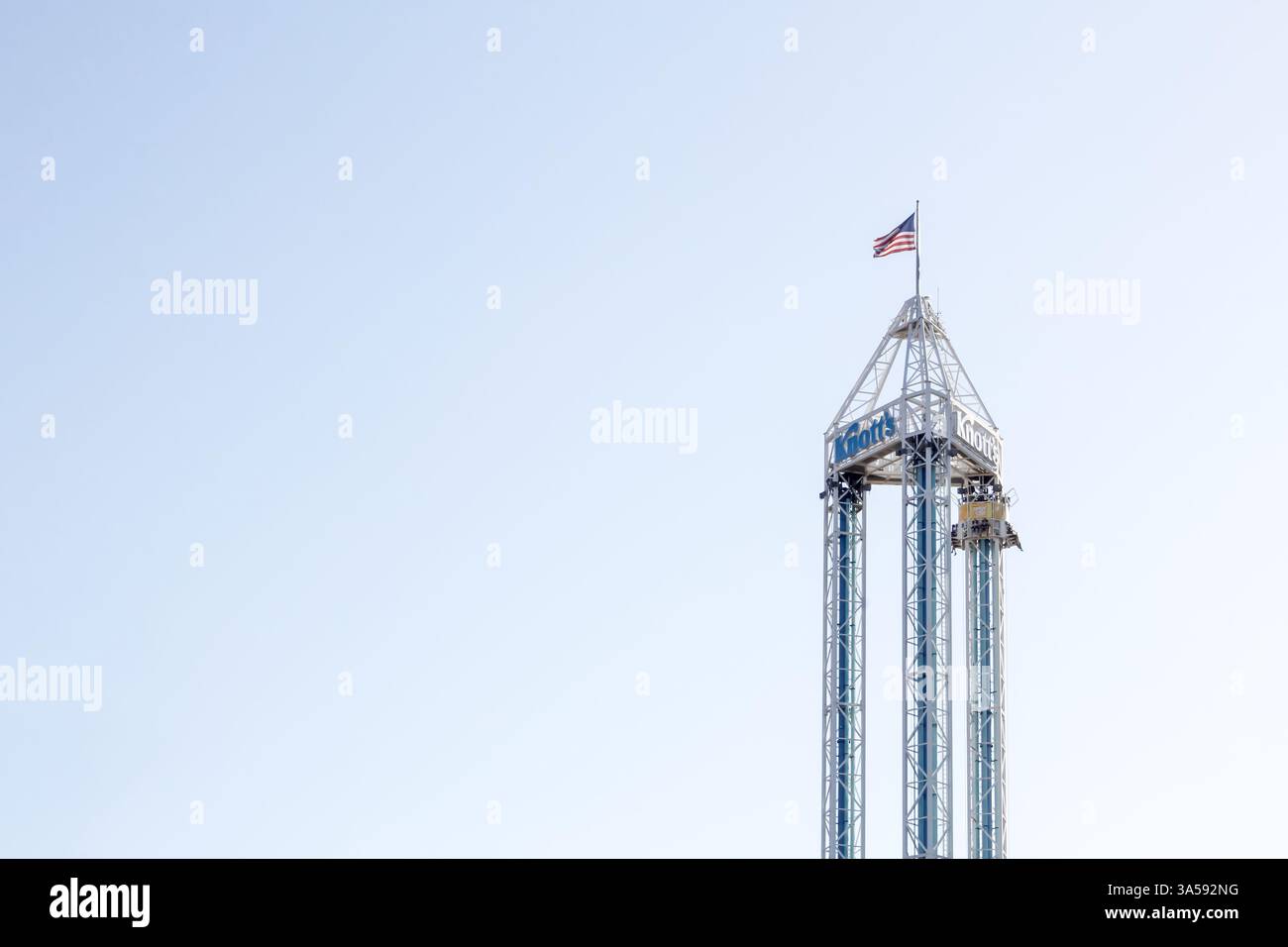 Buena Park, California, United States - 08-05-2019: A view of the Supreme Scream ride, on the right side of the frame. Stock Photo