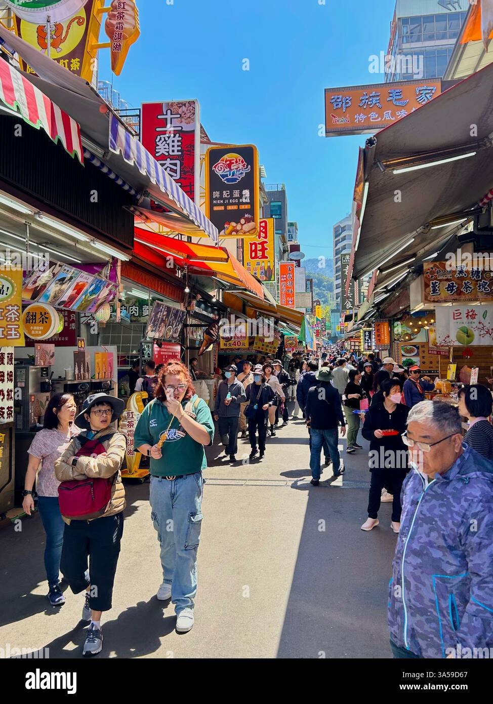 Yuchi, Taiwan, Crowd People Tourists, Visiting Tourist Region, 'Sun Moon Lake', Old Town Road with Local Commerce, Stores Fronts - Smartphone Captured Stock Image