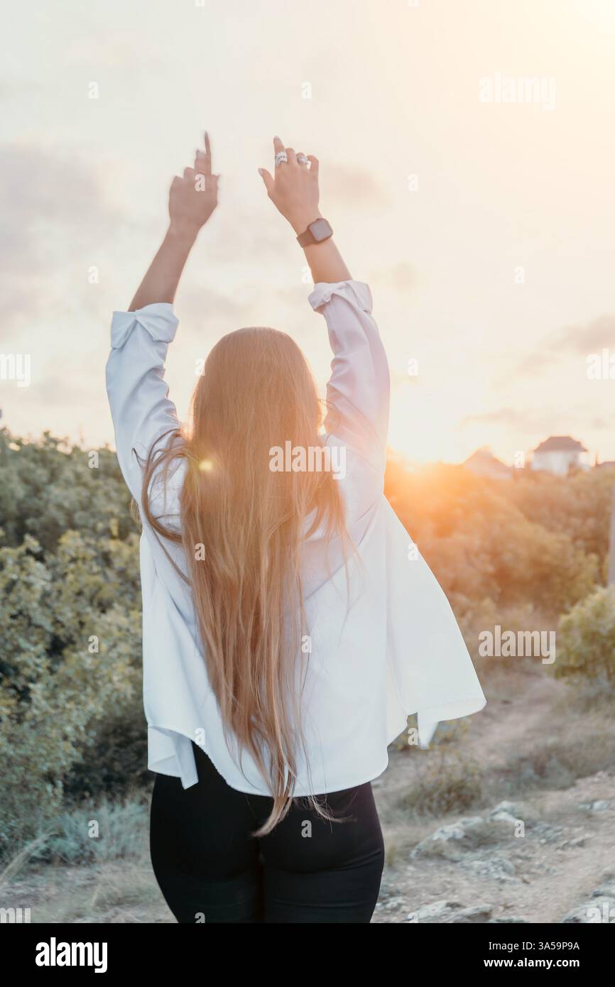 Black girl raises arms hi-res stock photography and images - Alamy