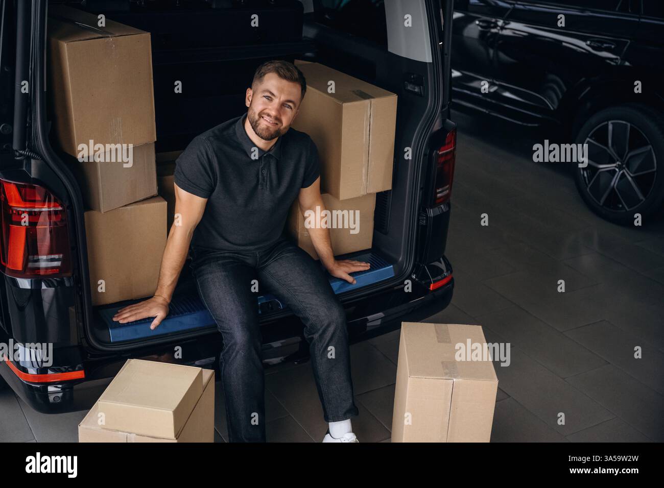Delivery man resting work hi-res stock photography and images - Alamy