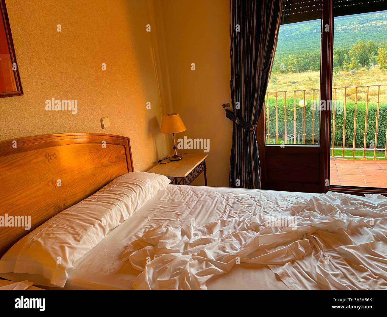 Unmade bed in a hotel. Segovia, Spain. - Smartphone Captured Stock Image