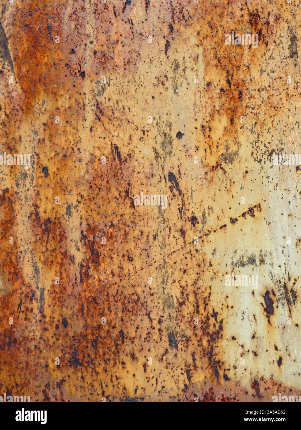 Rust forms an interesting pattern on a metal surface Stock Photo