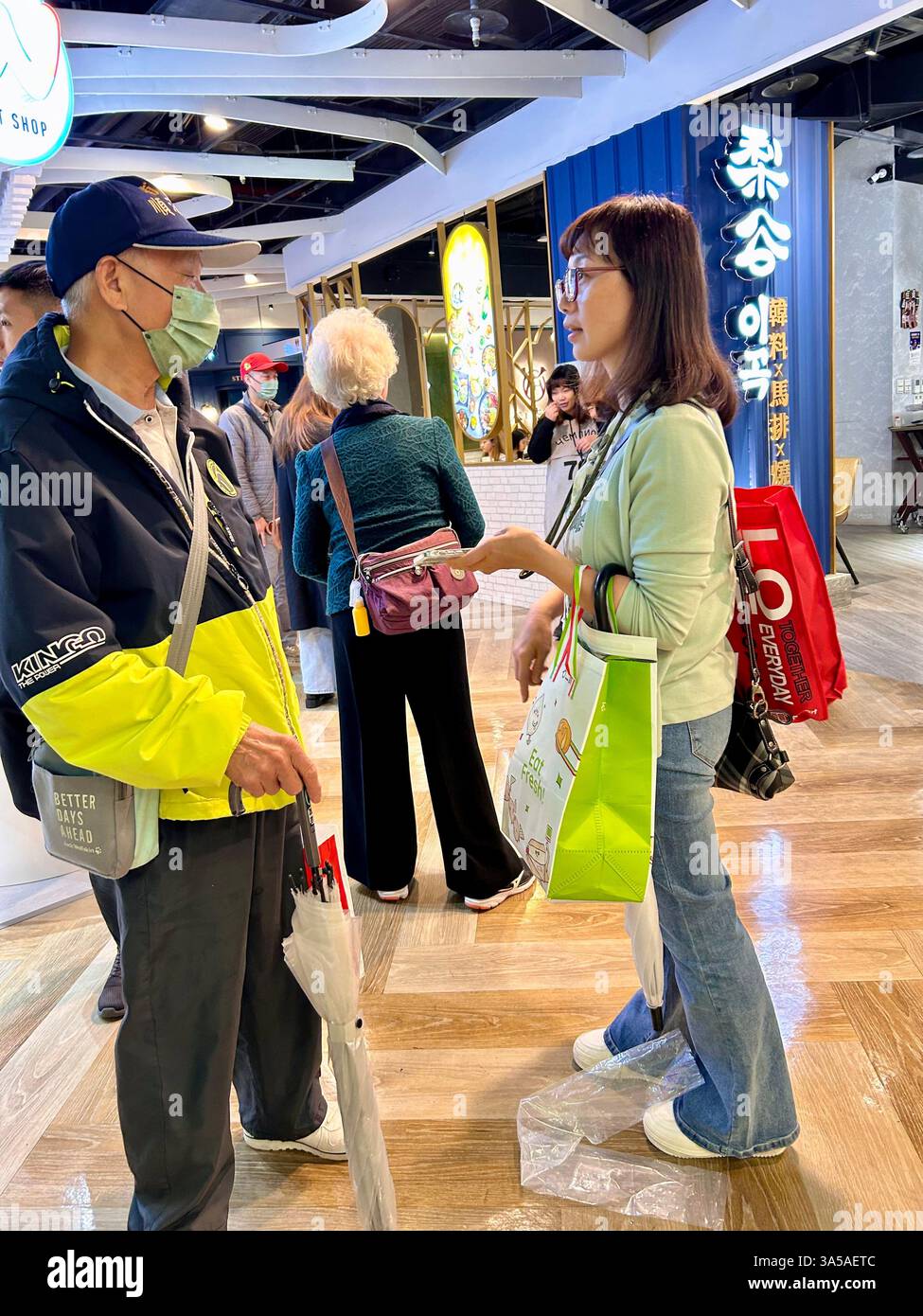 Taipei, Taiwan, Crowd Taiwanese People, Using Smart Phones inside Department Store - Smartphone Captured Stock Image