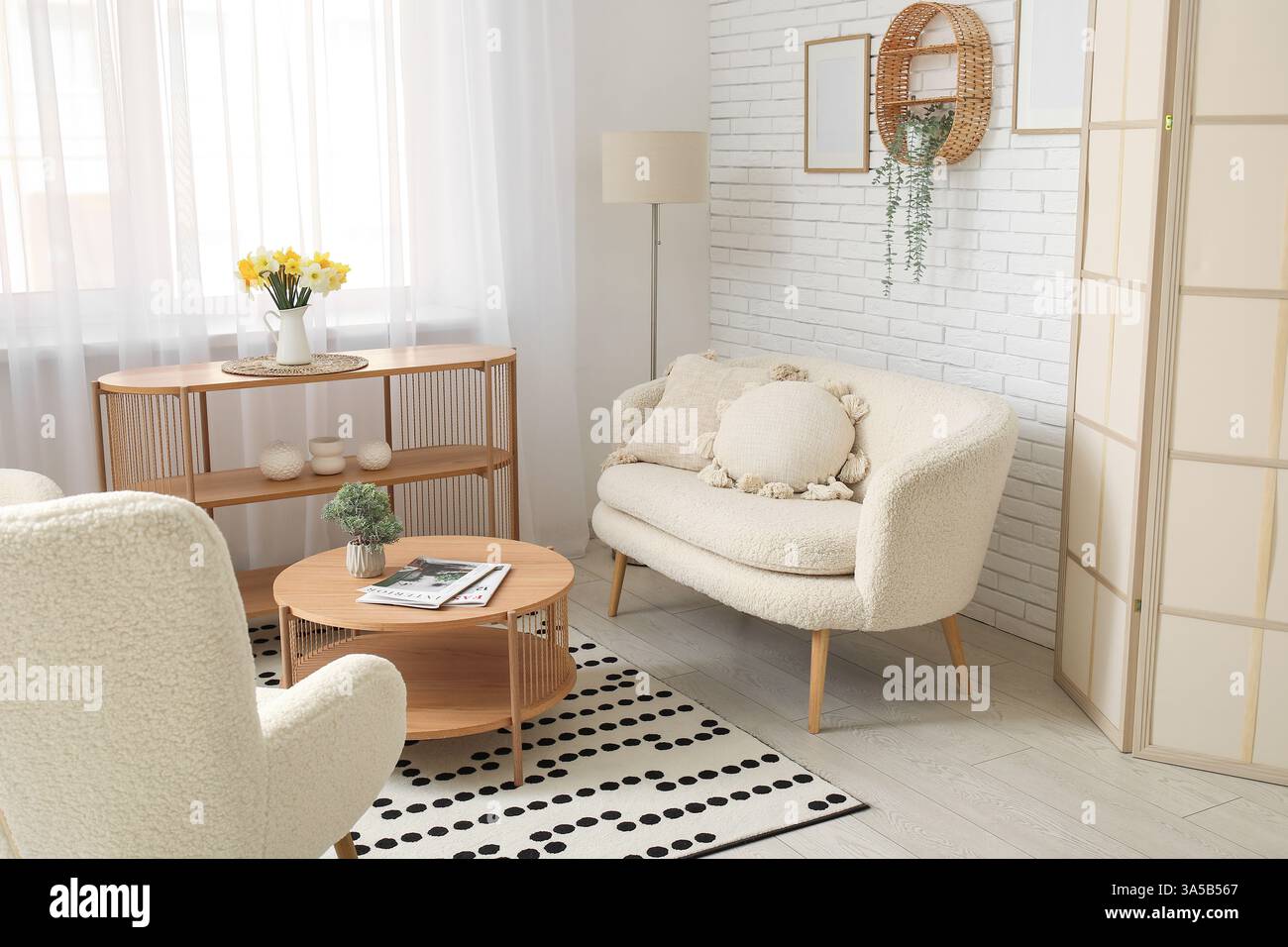Interior of living room with cozy sofa, cushions and coffee table Stock ...