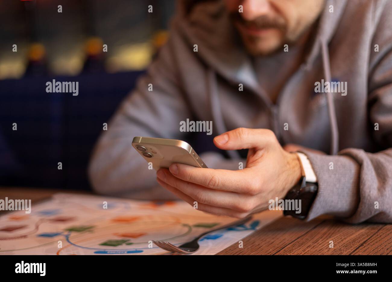 close up young man using smartphone Stock Photo