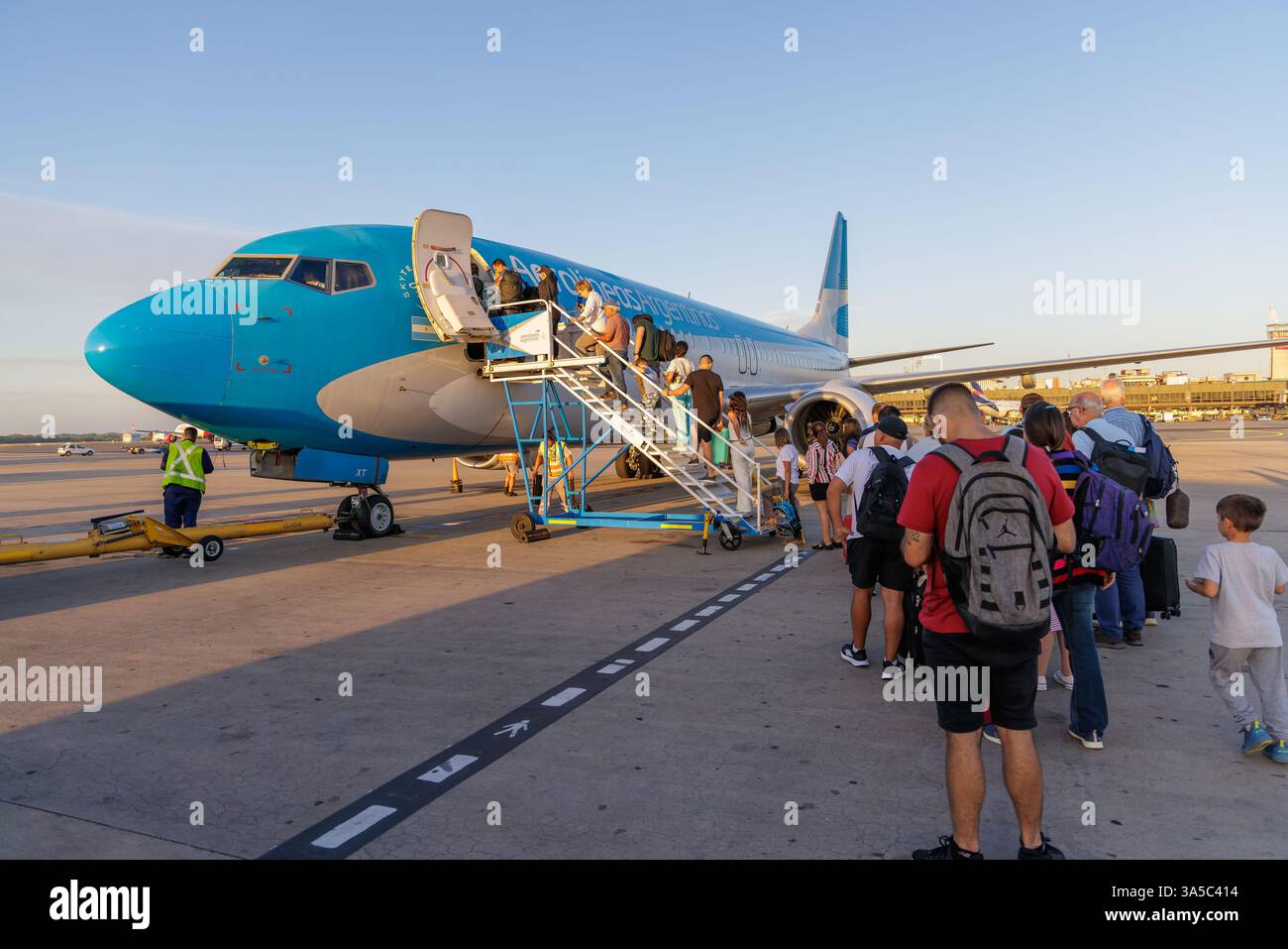 Buenos Aires, Argentina - January 10th, 2025: Tourists boarding a plane at Ezeiza International Airport in Buenos Aires. Stock Photo