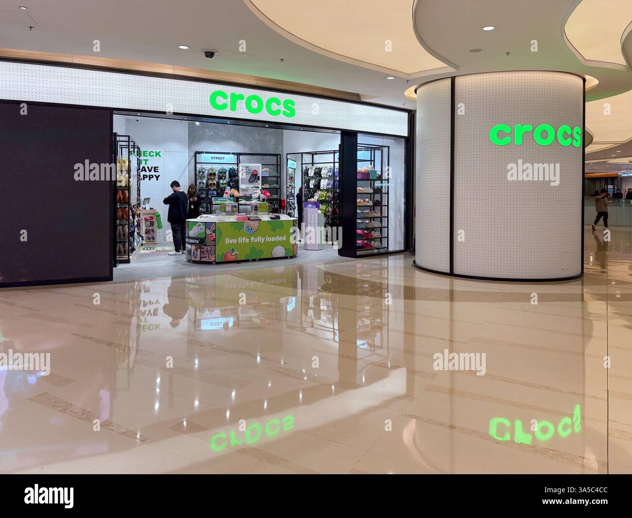 Crocs store interior front view, located inside a busy Hong Kong ...