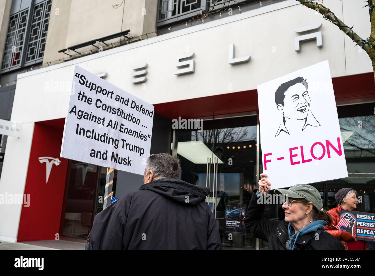 Tesla Outrage Seattle, USA. 22nd Mar 2025. Just after 10:00am Activists descend on ...
