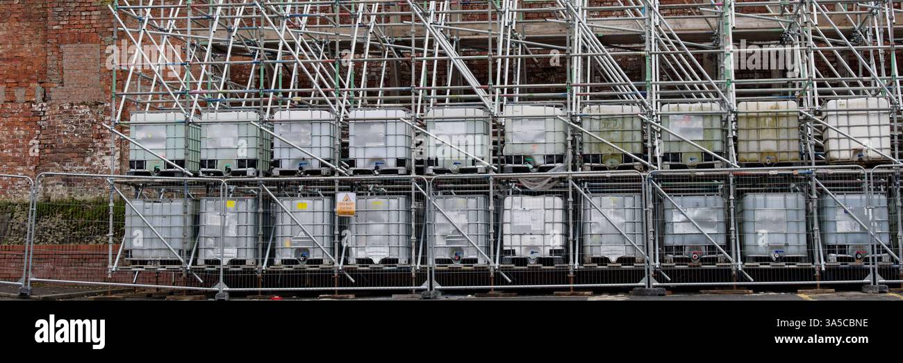 Scaffolding surrounding residential development for safe access to ...