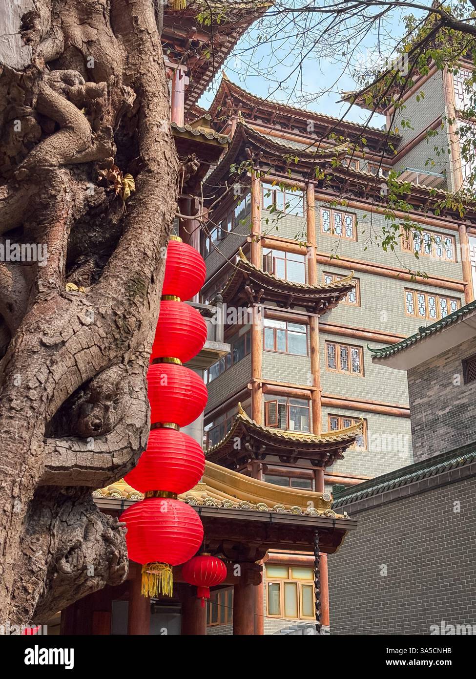 Traditional temple architecture with red lanterns in Guangzhou, China ...
