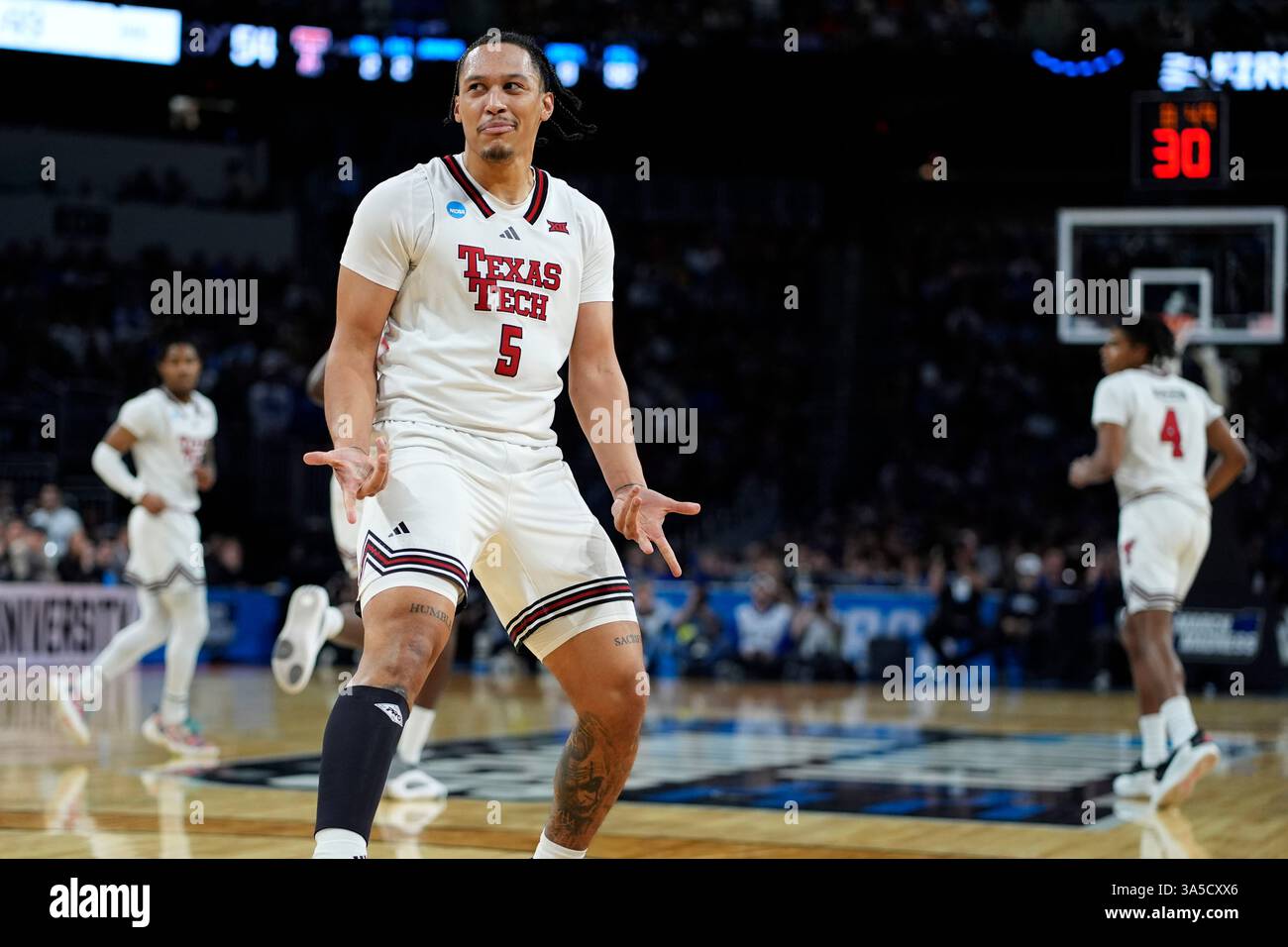 Texas Tech forward Darrion Williams (5) celebrates after making a ...