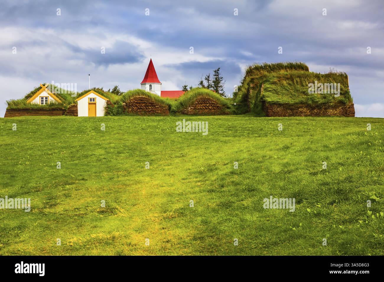 Farm Museum in Glaumbaer. The picturesque village of old houses covered with turf and grass. The concept of the ethnographic and cultural tourism Stock Photo