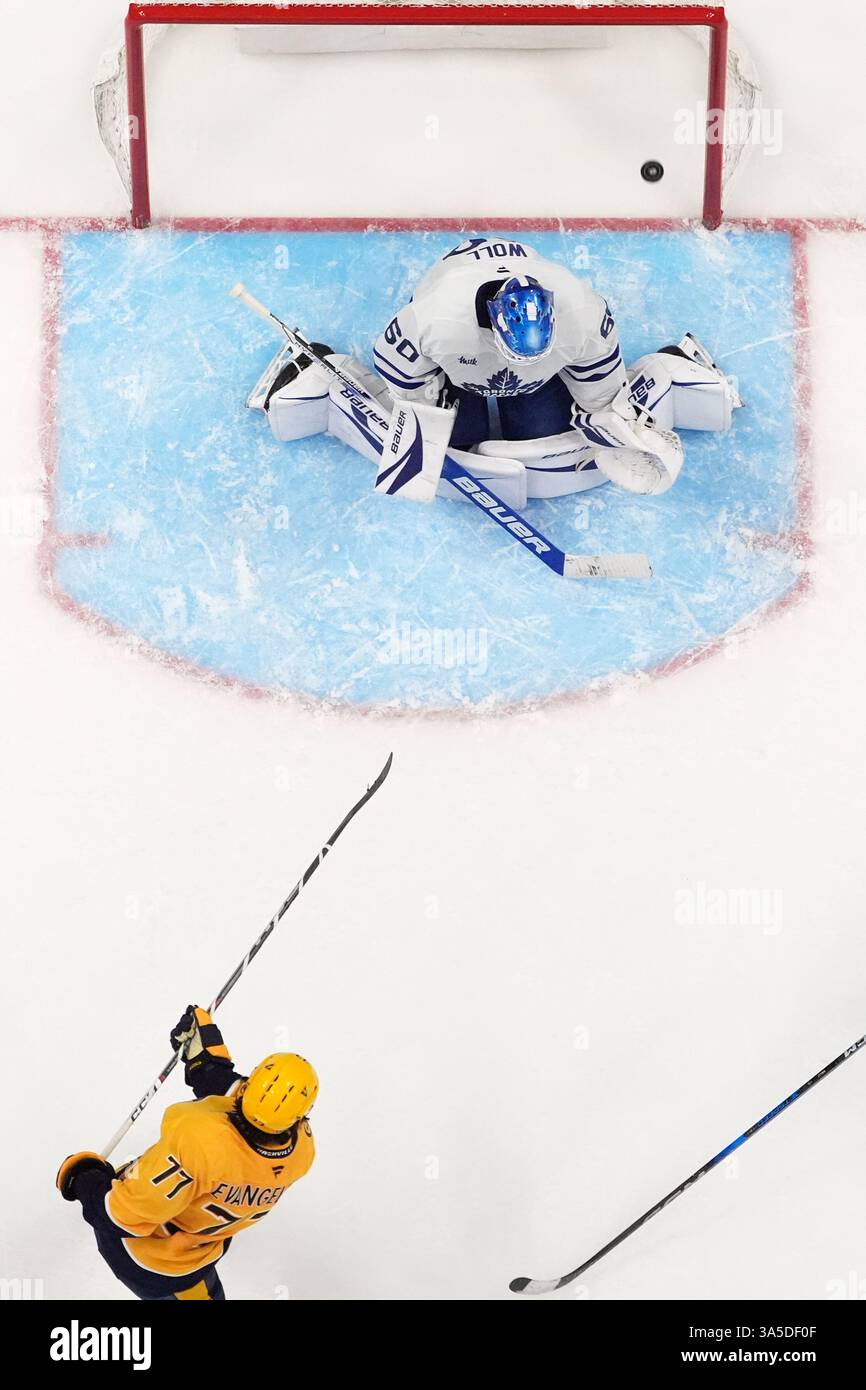 Nashville Predators right wing Luke Evangelista (77) scores a goal past ...