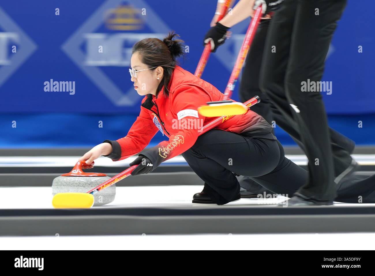 China's skip Wang Rui releases the stone during the bronze medal match ...