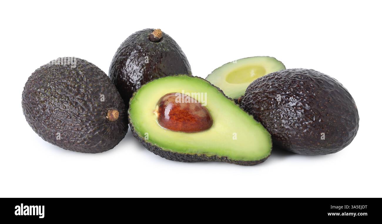 Whole and cut ripe avocados isolated on white Stock Photo - Alamy