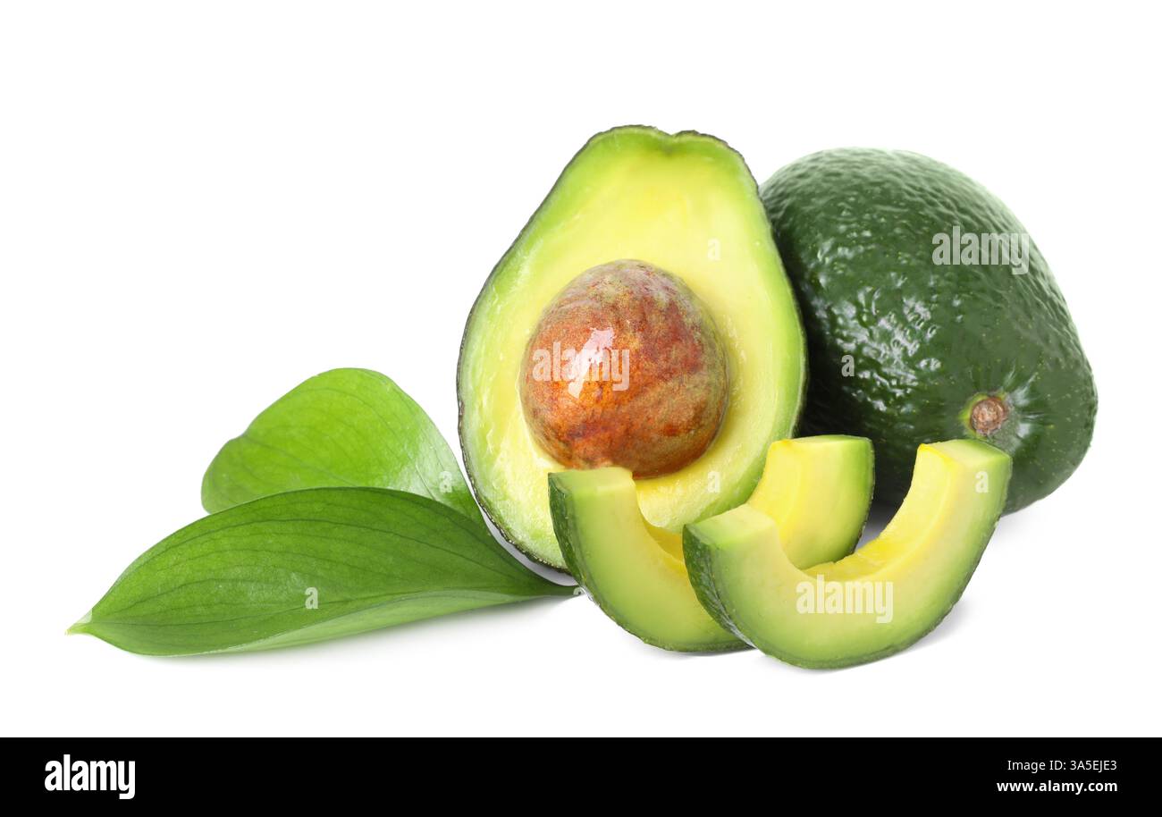 Whole and cut avocados isolated on white Stock Photo - Alamy