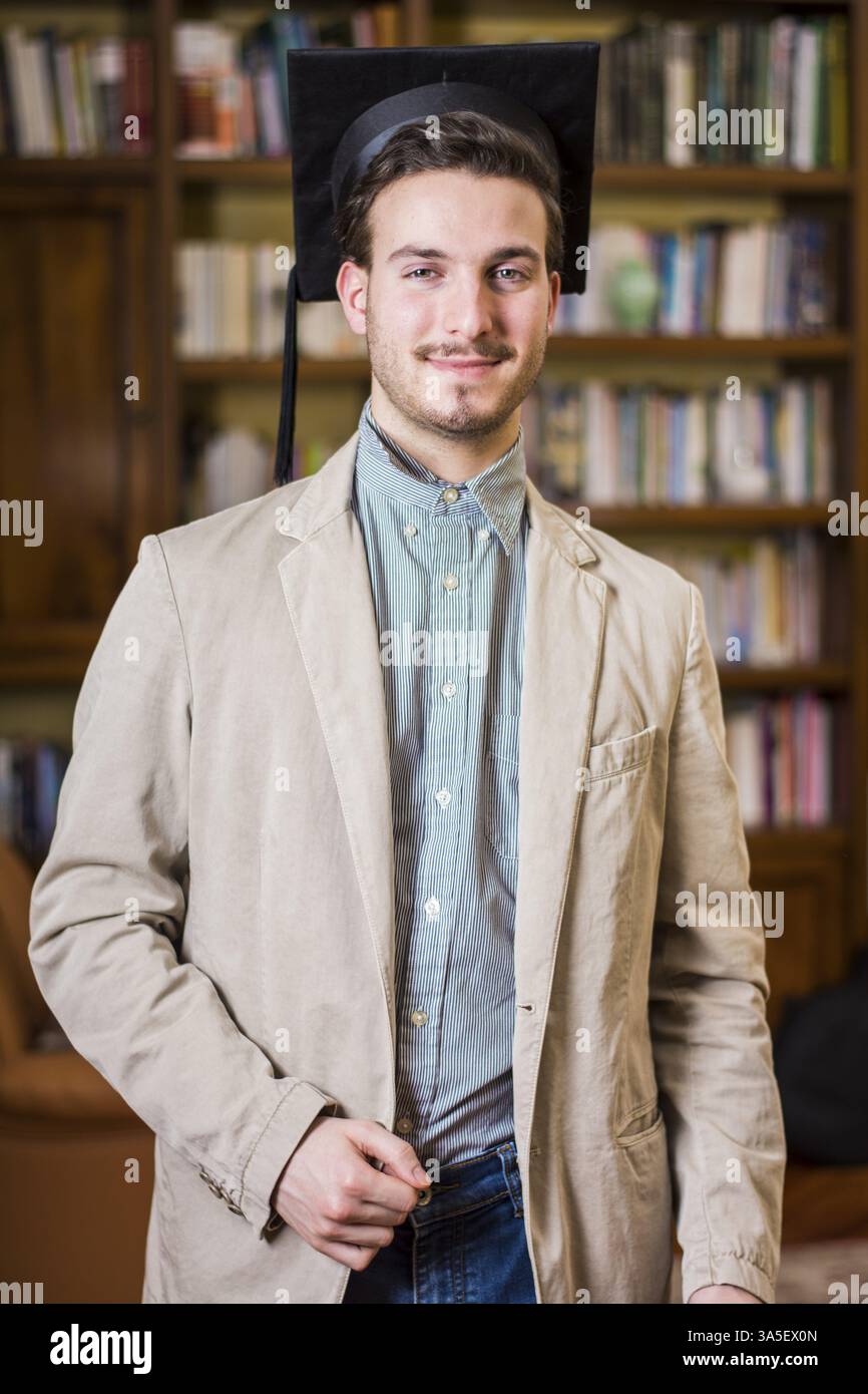 Graduate wearing academic gown hi-res stock photography and images - Alamy