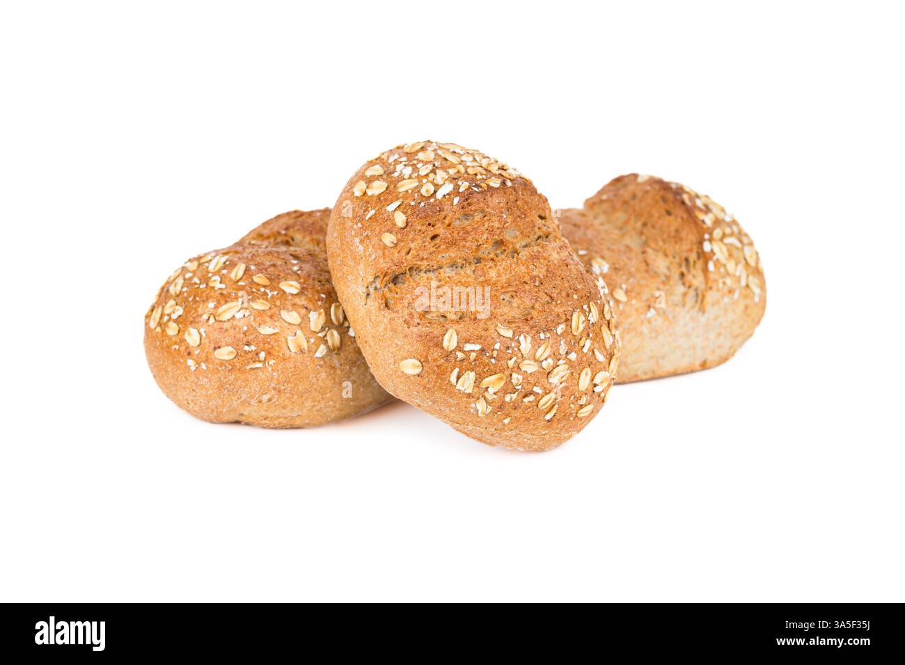 Crispy bread rolls with oat isolated on white background. Fresh crispy bread rolls. Three bread rolls on white. Stock Photo