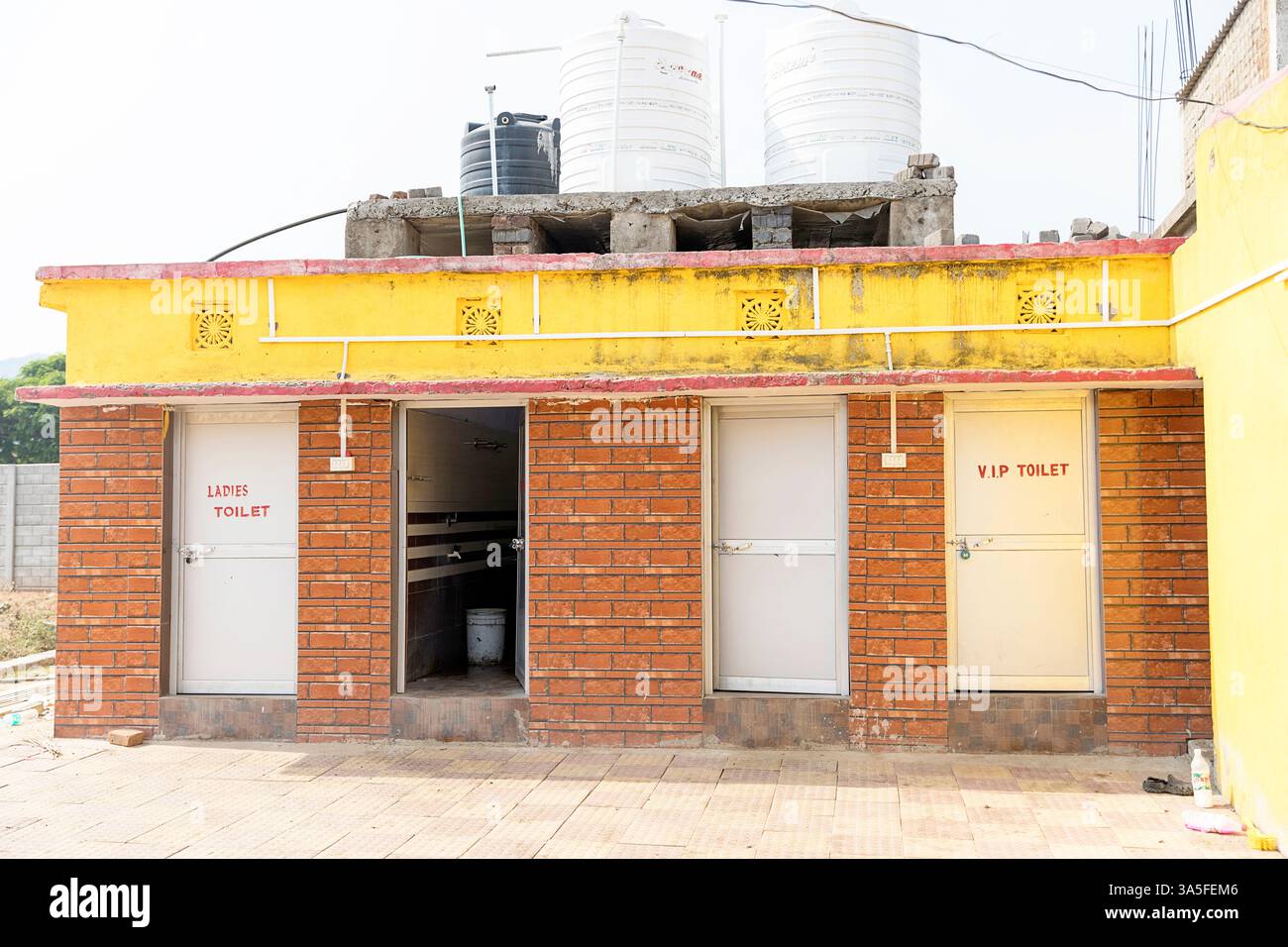 Public toilet with vip service in a small town in orissa in india Stock Photo