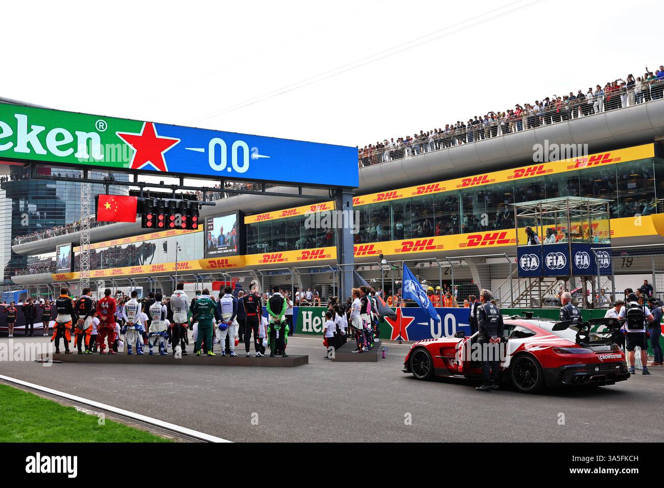 Shanghai, China. 23rd Mar, 2025. Drivers as the grid observes the ...