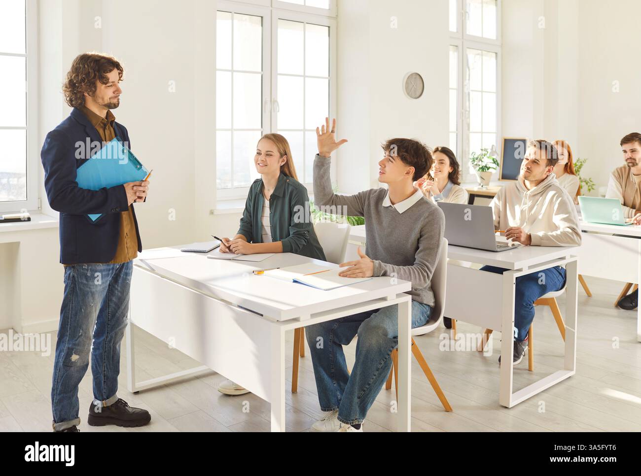 Teacher and students group in class during lesson, working and study in ...